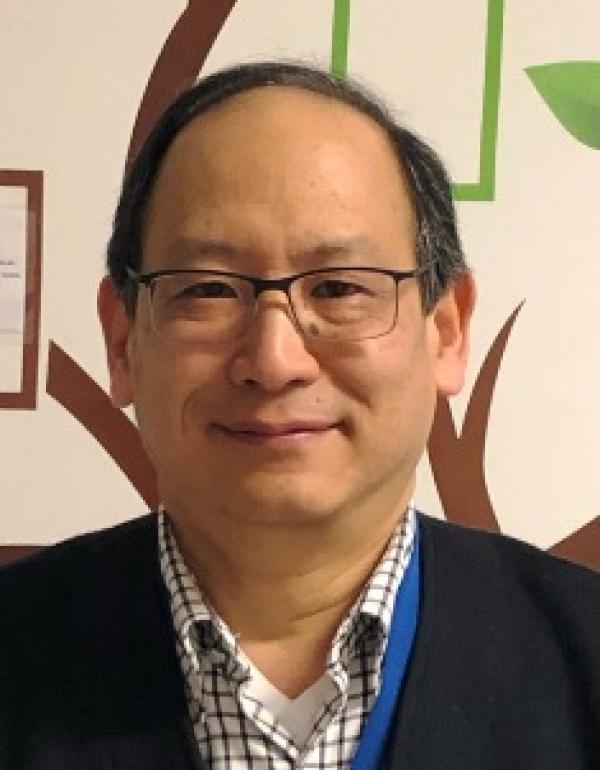 Dr.   Michael  Chan